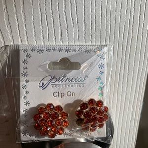Orange clip on earrings